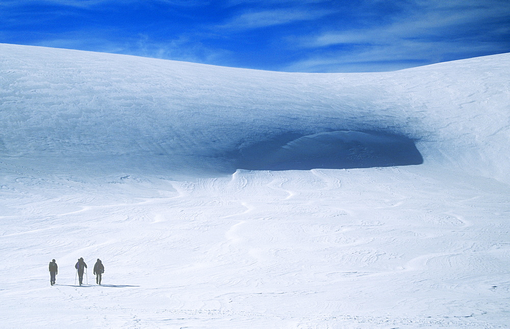 Mountaineers crossing the Cairngorm plateau in winter, Scotland, United Kingdom, Europe