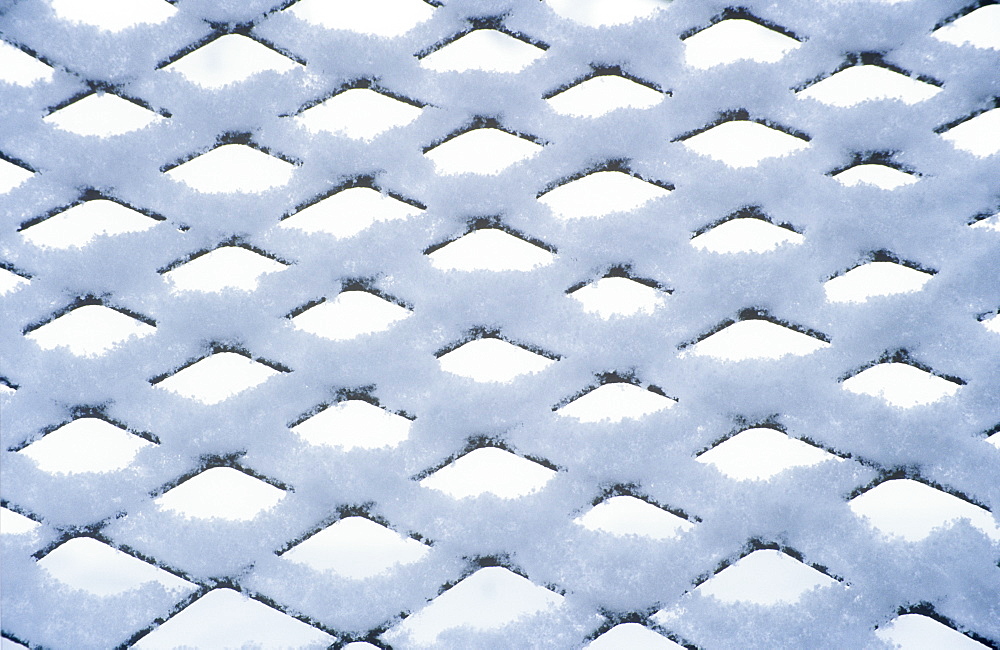 Snow settling on a fence, United Kingdom, Europe