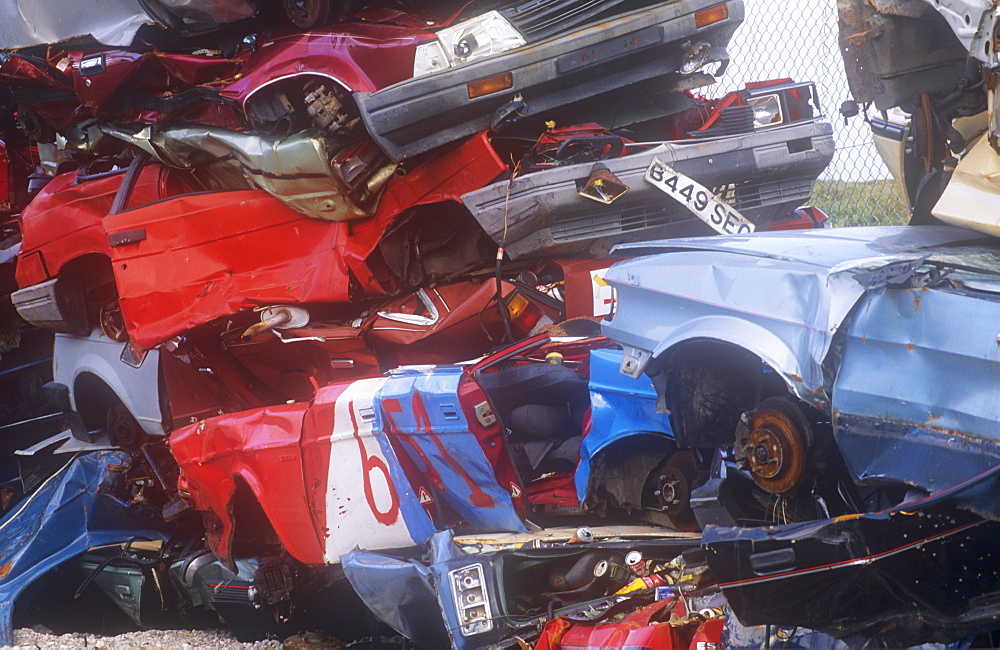 Old cars at a scrap dealers in Barrow in Furness, Cumbria, England, United Kingdom, Europe