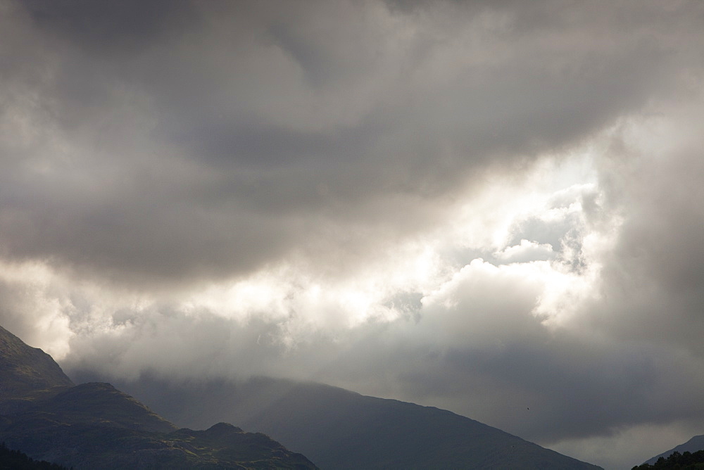 A hole in the cloud over Wrynose Pass, Lake District Cumbria, England, United Kingdom, Europe