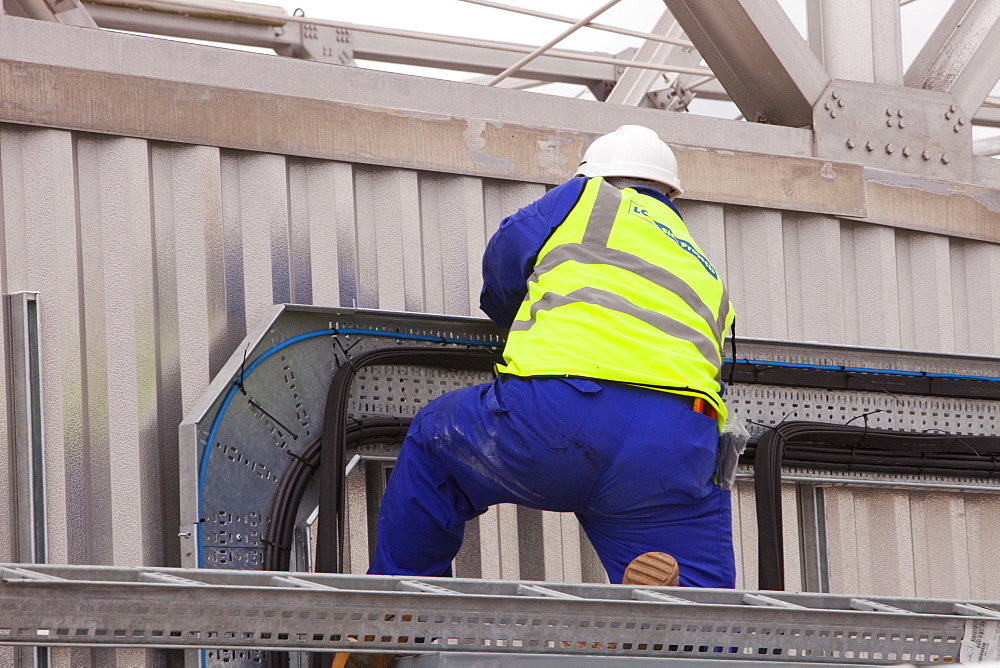 A contract worker at Daveyhulme wastewater treatment plant in Manchester, England, United Kingdom, Europe