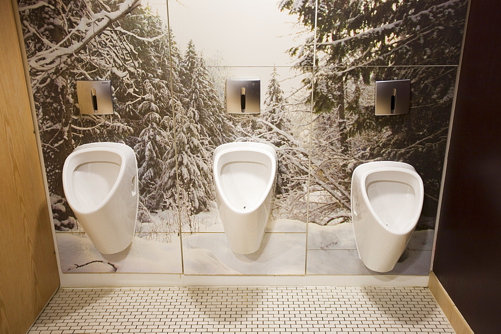 Gents urinals at the Chill Factor, an indoor skiing area in Manchester, England, United Kingdom, Europe