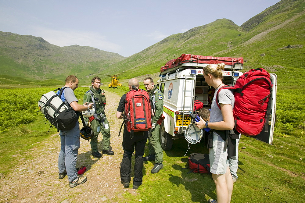 Langdale Ambleside mountain Rescue Team with a Sea King Helicopter in Langdale, Lake District, Cumbria, England, United Kingdom, Europe