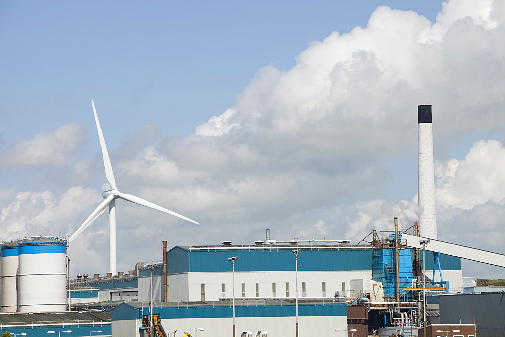 Wind turbines producing renewable electricity in the grounds of the Iggesund paperboard manufacturer on the outskirts of Workington, Cumbria, England, United Kingdom, Europe