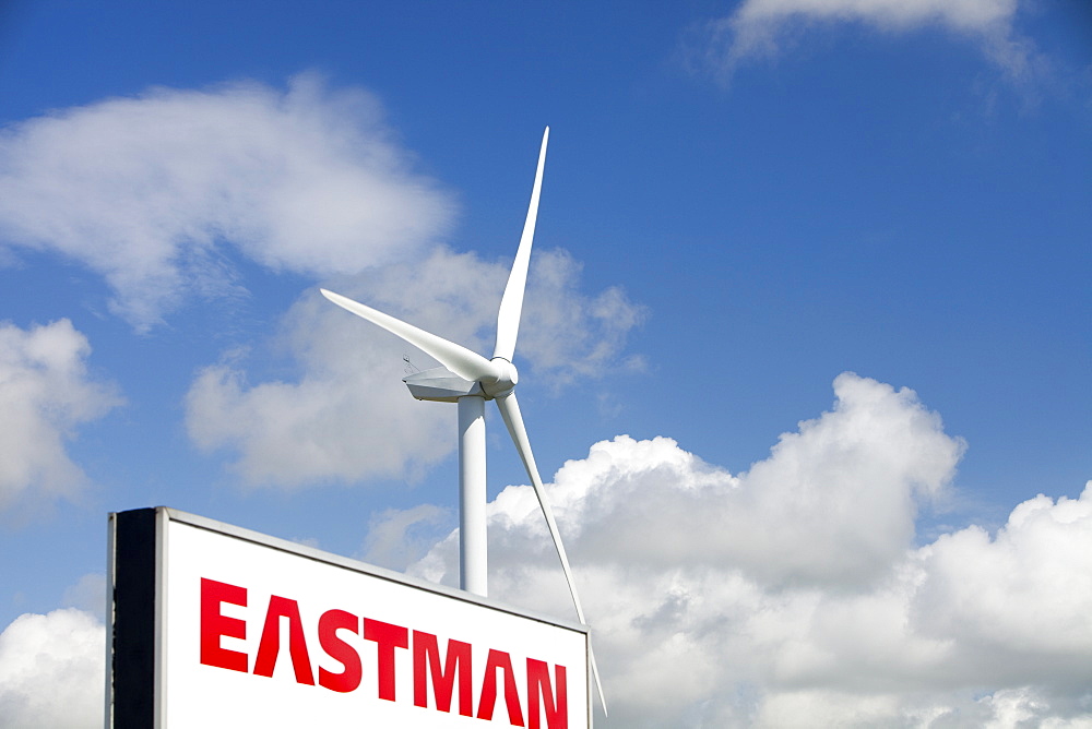 A 2 MW wind turbine producing renewable electricity in the grounds of the Eastman factory on the outskirts of Workington, Cumbria, England, United Kingdom, Europe