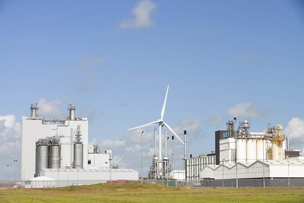 A 2 MW wind turbine producing renewable electricity in the grounds of the Eastman factory on the outskirts of Workington, Cumbria, England, United Kingdom, Europe