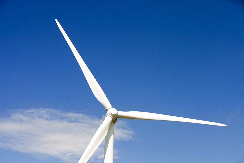 A 2 MW wind turbine producing renewable electricity in the grounds of the Eastman factory on the outskirts of Workington, Cumbria, England, United Kingdom, Europe