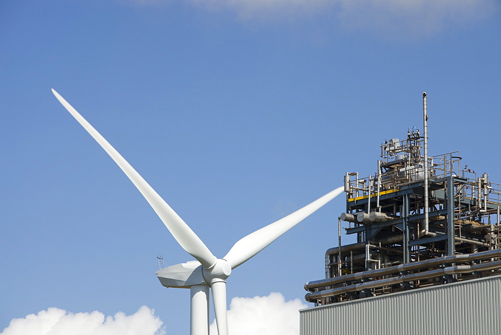 A 2 MW wind turbine producing renewable electricity in the grounds of the Eastman factory on the outskirts of Workington, Cumbria, England, United Kingdom, Europe