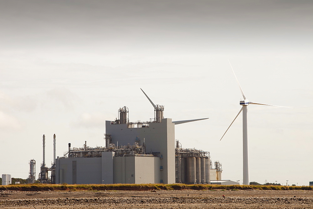 Two MW wind turbine producing renewable electricity in the grounds of the Eastman factory on the outskirts of Workington, Cumbria, England, United Kingdom, Europe