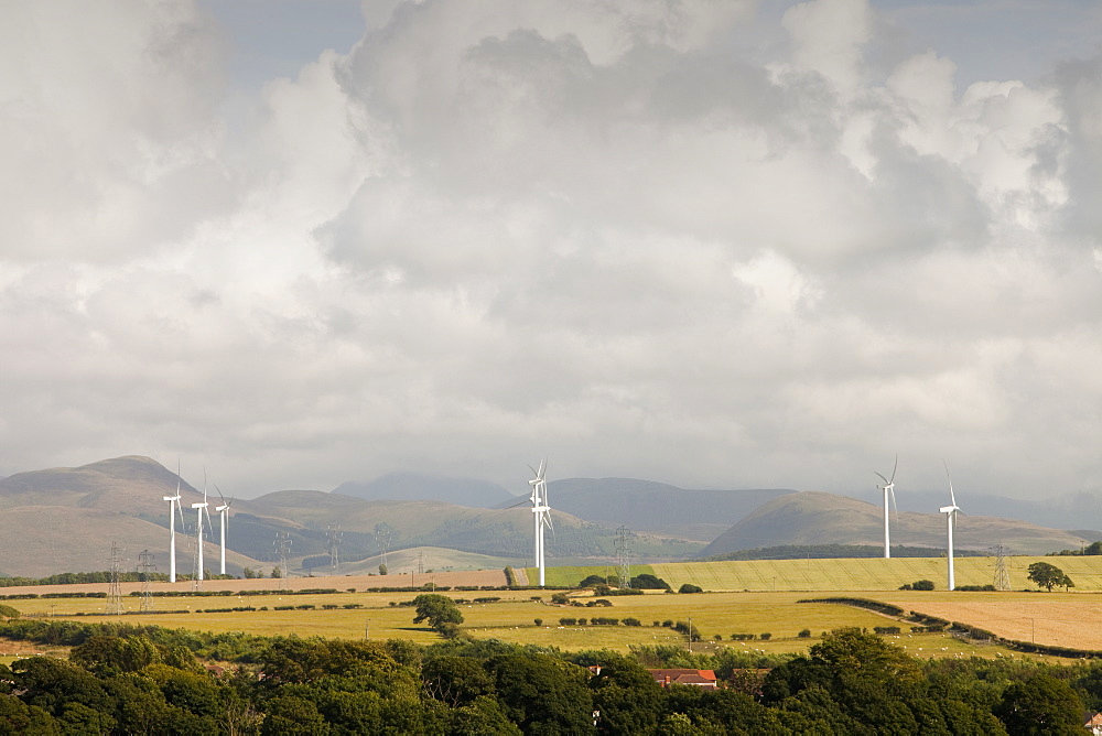 Wind turbines on the outskirts of Workington, with the Lake District hills beyond, Cumbria, England, United Kingdom, Europe