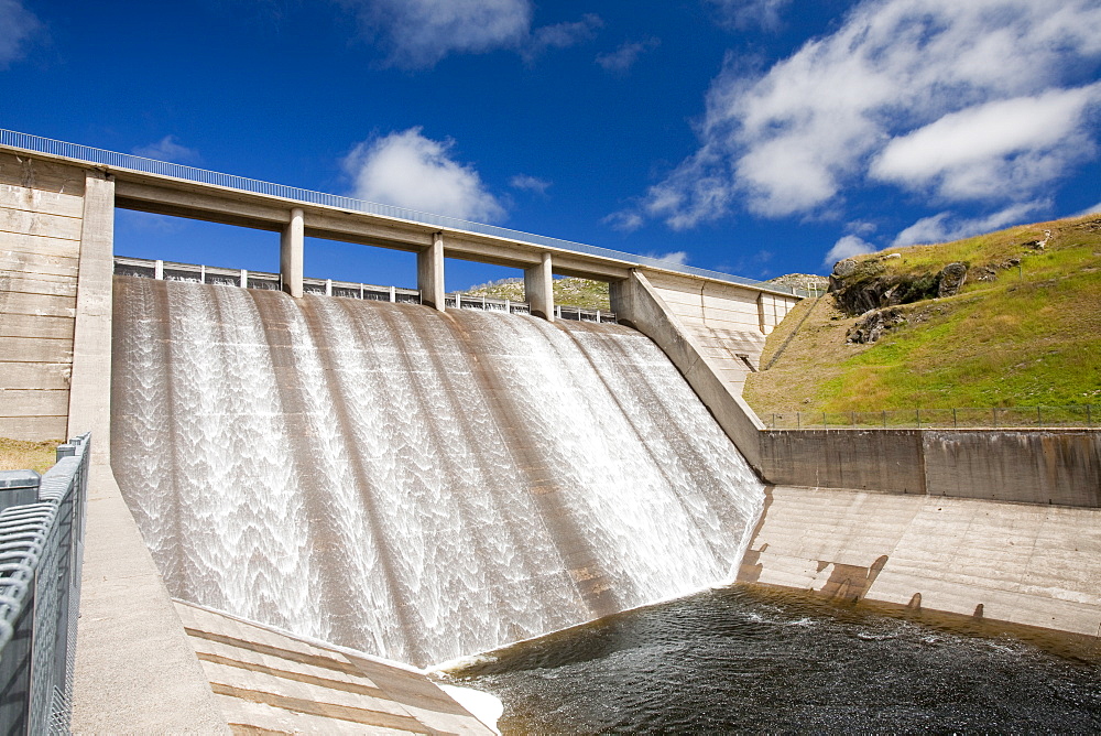 Guthega Dam supplying the water to power Guthega power station as part of the Snowy Mountains hydro scheme, New South Wales, Australia, Pacific