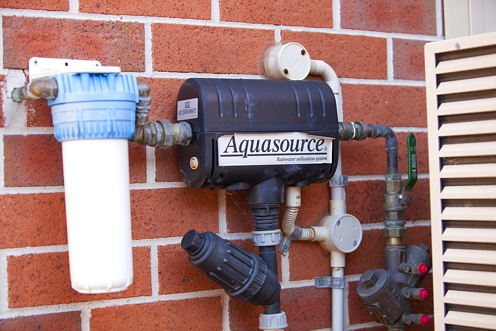 An aquasource pump that pumps rain water collected off the house roof and stored in an underground tank for use in flushing toilets, Sydney, New South Wales, Australia, Pacific