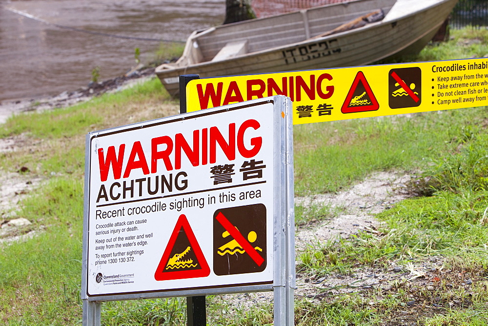 Crocodile warning signs on the side of the Daintree River in Northern Queensland, Australia, Pacific