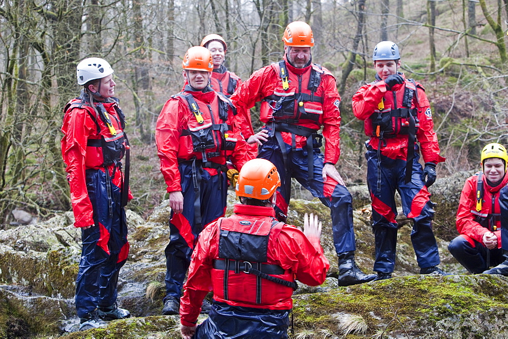 Members of the Langdale Ambleside Mountain Rescue Team train in Swift water rescue techniques on the River Brathay at Skelwyth, Lake District, Cumbria, England, United Kingdom, Europe