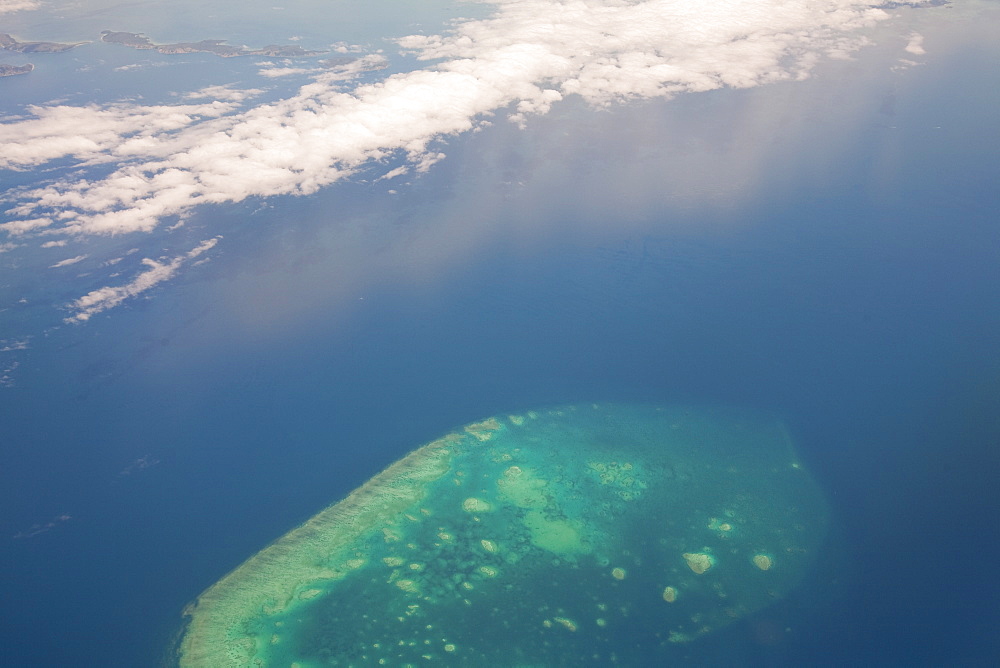 A coral atoll from the air, part of the Great Barrier Reef near Cairns, Queensland, Australia, Pacific