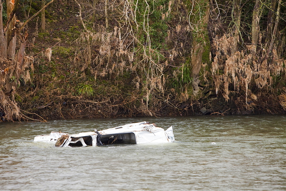 A van washed away during the November 2009 floods in the River Derwent, downstream of Cockermouth, Cumbria, England, United Kingdom, Europe