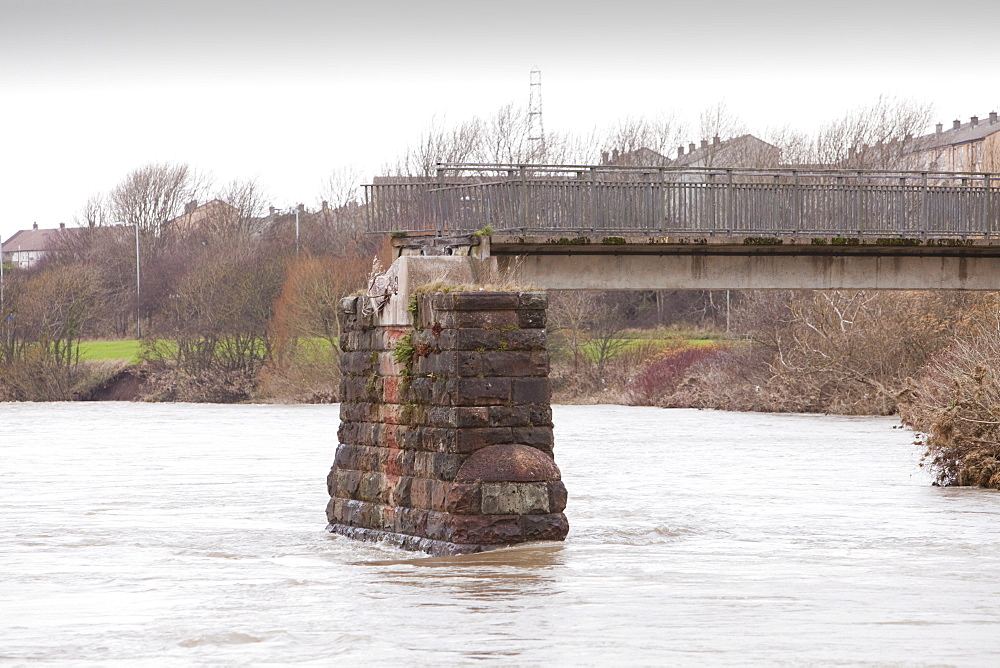 A footbridge over the River Derwent in Workington, one of many destroyed or damaged in the floods, Cumbria, England, United Kingdom, Europe