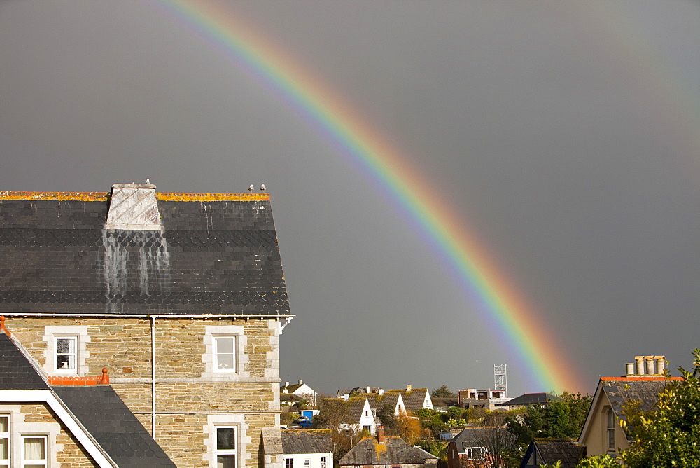 A rainbow and shower over Fowey in Cornwall, England, United Kingdom, Europe