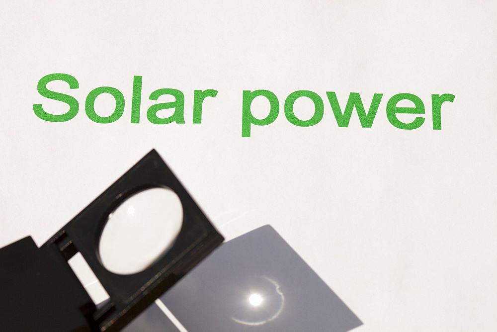 Solar power, concentrating the sun's power through a magnfying glass