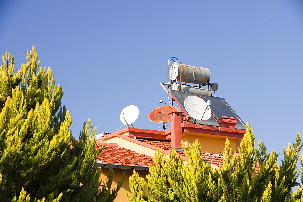 Solar water heaters on houses in Teos, in Western Turkey, Eurasia