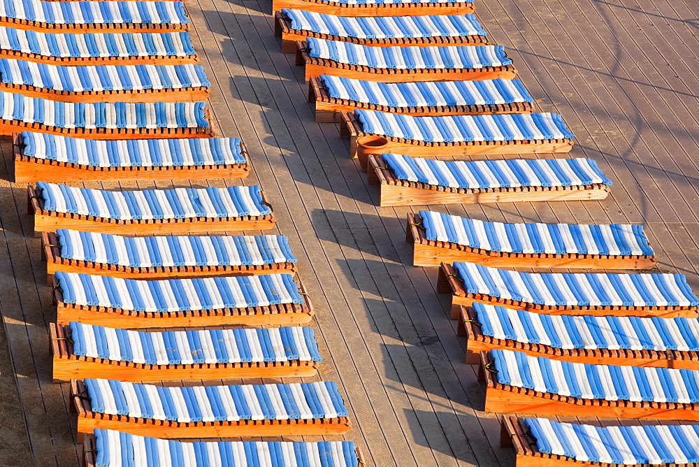 Sunbathing loungers at a holiday resort in Teos, Western Turkey, Eurasia