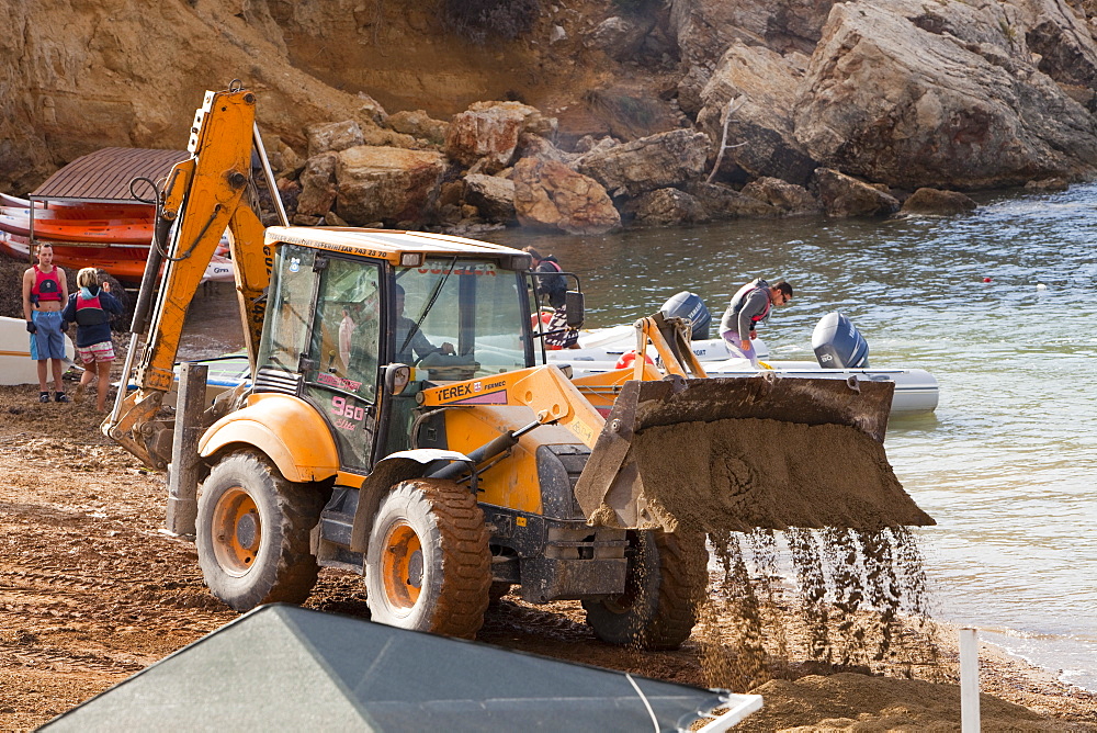 Repairing storm damage by adding new sand to a beach in Teos, Western Turkey, Eurasia