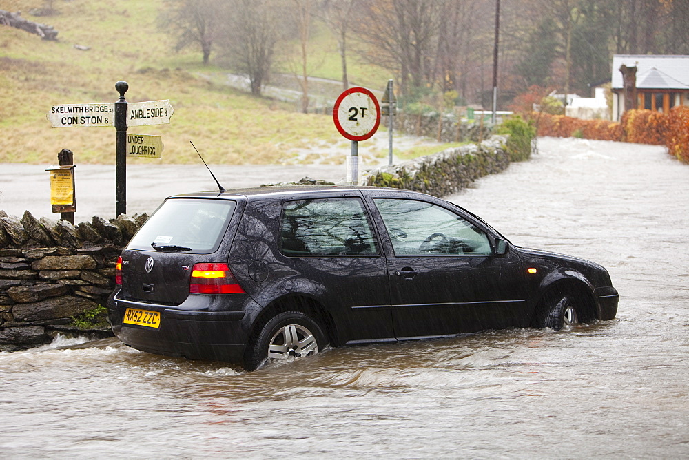 A flooded car in Ambleside, Lake District, Cumbria, England, United Kingdom, Europe