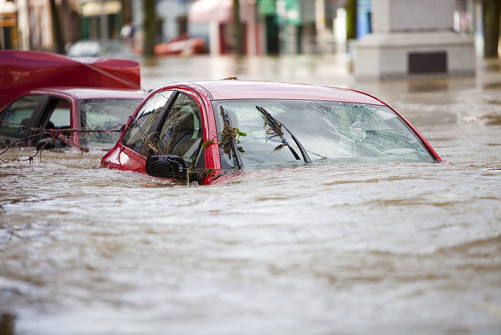 Flooded cars on Cockermouth's Main Street, Cumbria, England, United Kingdom, Europe