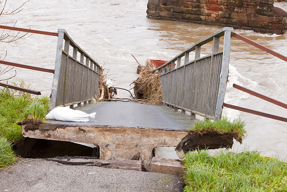 A footbridge over the River Derwent in Workington, one of many destroyed or damaged in the floods, Cumbria, England, United Kingdom, Europe