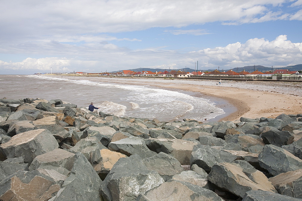 Rocks placed to re-inforce the sea wall in the area of the North Wales coast between Prestatyn and Abergele which was reclaimed from an ancient salt marsh, and is flat, low lying and susceptible to coastal flooding, Wales, United Kingdom, Europe