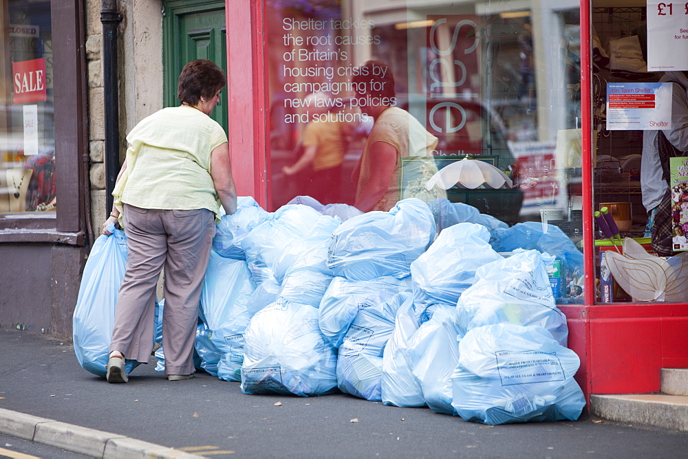 Trade waste bags outside a charity shop in Clitheroe, Lancashire, England, United Kingdom, Europe