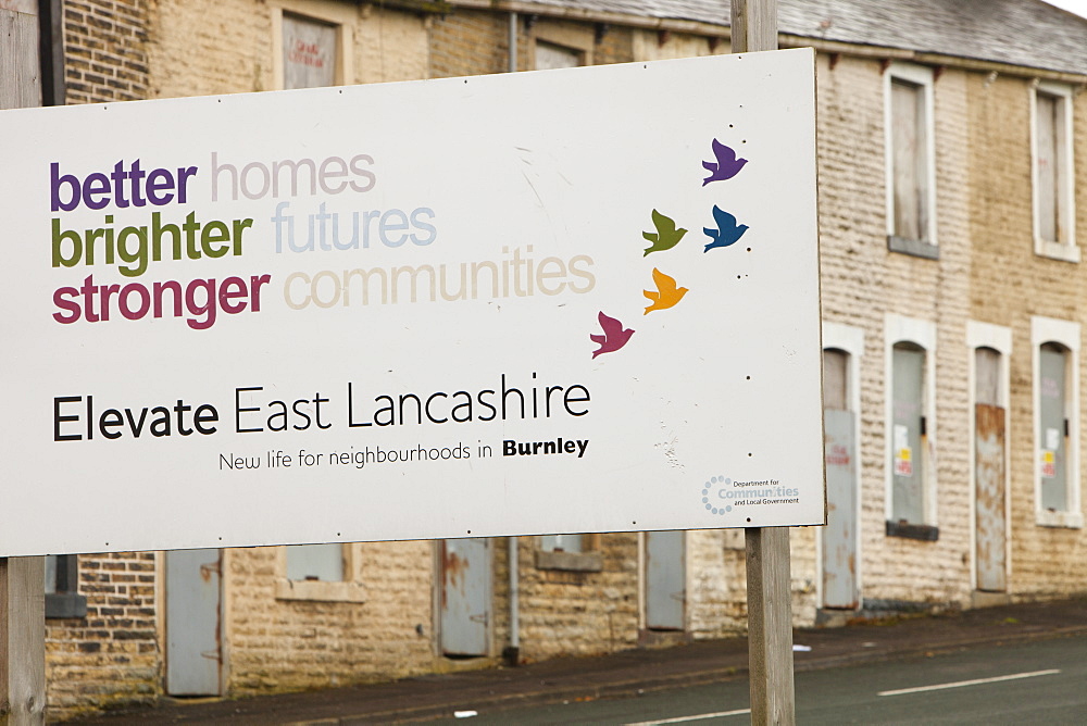 Boarded up terraced houses that have been compulsorily purchased for demolition in the Burnley Wood area of Burnley, Lancashire, England, United Kingdom, Europe