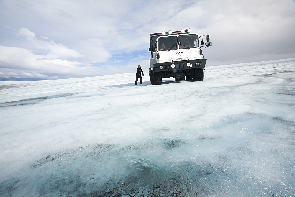 A twenty ton ice explorer truck owned and run by Arngrimur Hermannsson (Arni), taking tourists onto the Langjokull ice cap, Iceland, Polar Regions