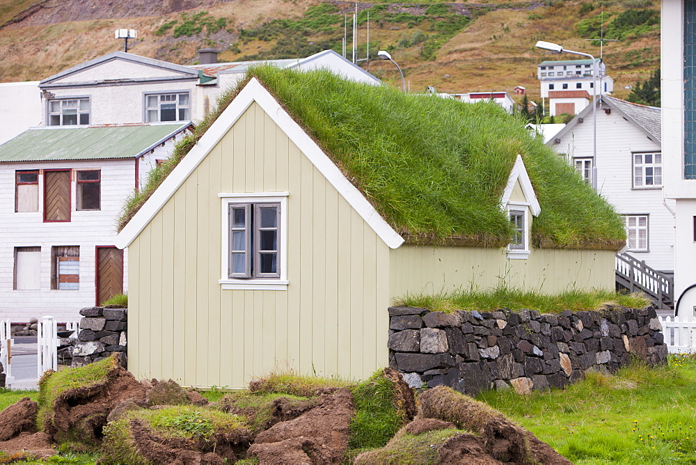 A green roofed house in Siglufjordur, Icelands most northerly town, Iceland, Polar Regions