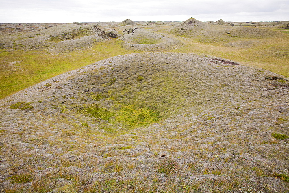 Pseudocraters at Kirkjubaejarklauster, formed by lava erupting onto a wet surface causing explosions of steam, Iceland, Polar Regions