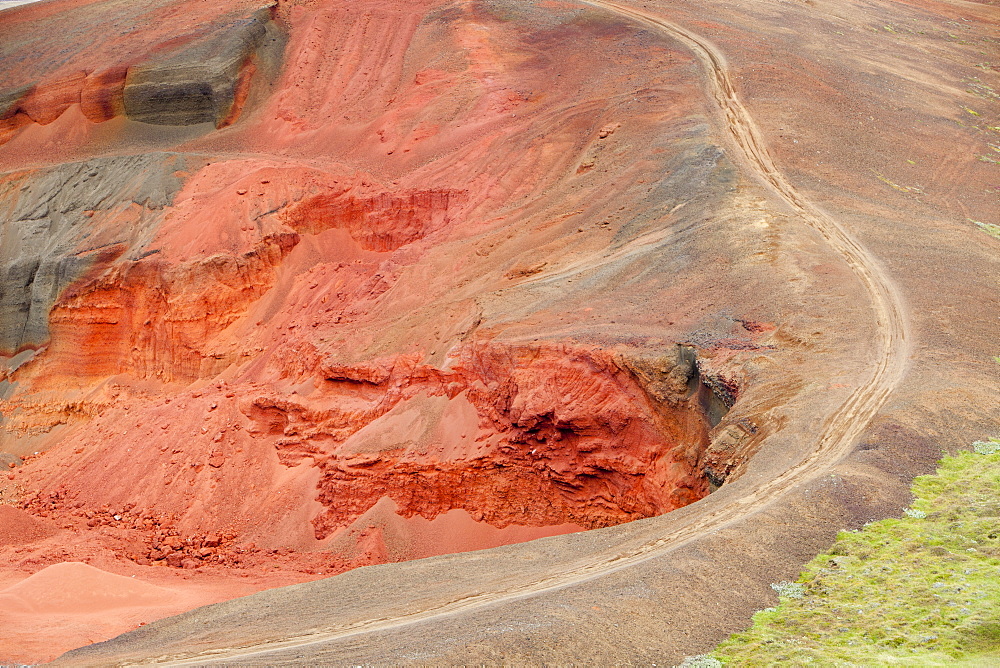 Excavating volcanic Scoria rock from the Seydisholar cone for road building material, near Selfoss, Iceland, Polar Regions