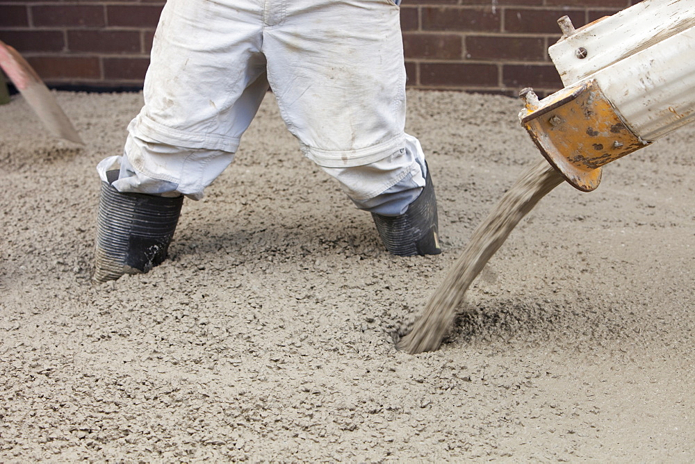 Pouring concrete for the floor of a house extension, Ambleside, Cumbria, England, United Kingdom, Europe