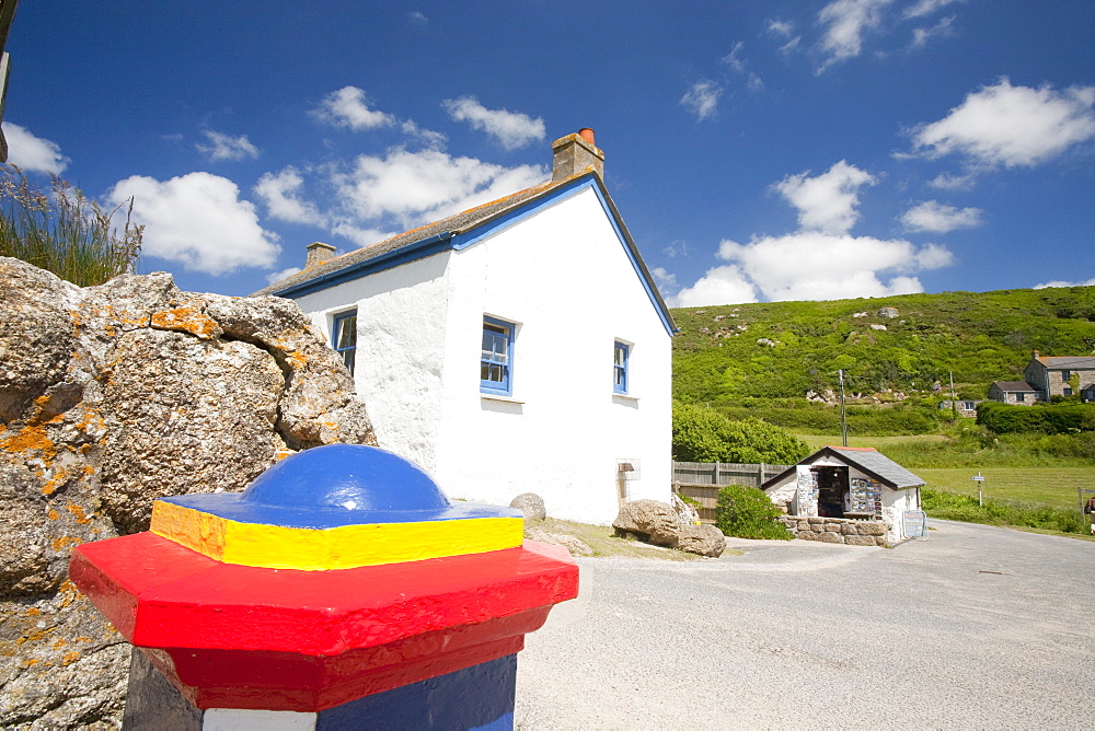 A house at Porthgwarra and a collecting box for the RNLI, on the Cornish coast near Lands End, Cornwall, England, United Kingdom, Europe