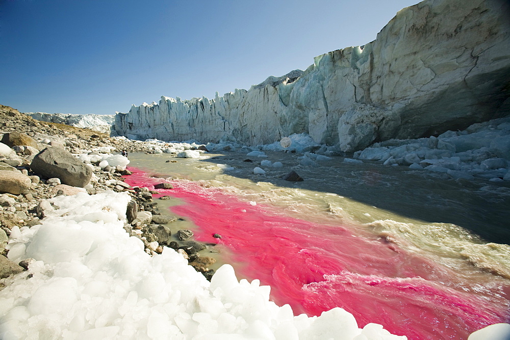 PHD scientist Ian Bartholomew using dye tracing techniques as part of a study to measure the speed of the Russell Glacier near Kangerlussuaq, Greenland, Polar Regions