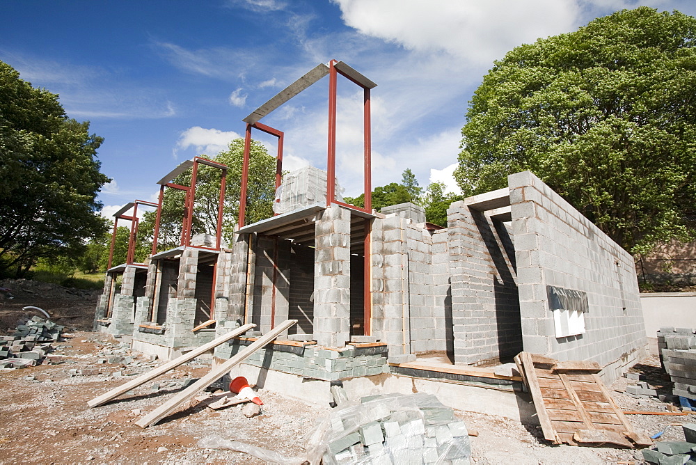 Local housing being built on a brownfield site, the old gas works in Ambleside, Cumbria, England, United Kingdom, Europe