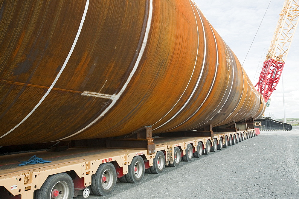 The massive monopiles that are hammered 30 metres into the seabed to anchor the wind turbines, Walney Offshore Wind Farm, Barrow in Furness, Cumbria, England, United Kingdom, Europe