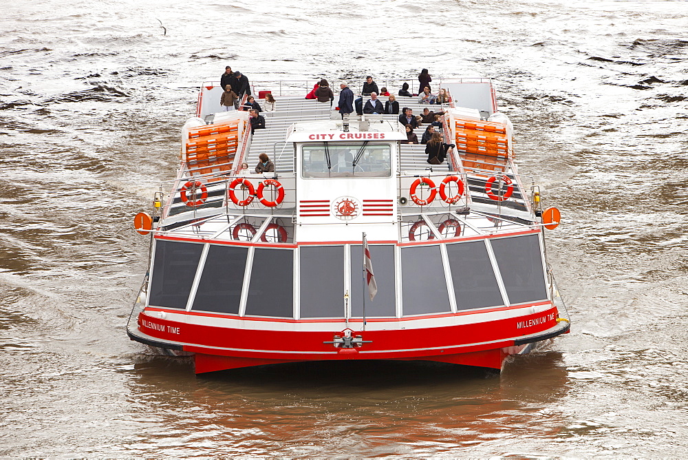 A tourist boat trip on the River Thames in London, England, United Kingdom, Europe