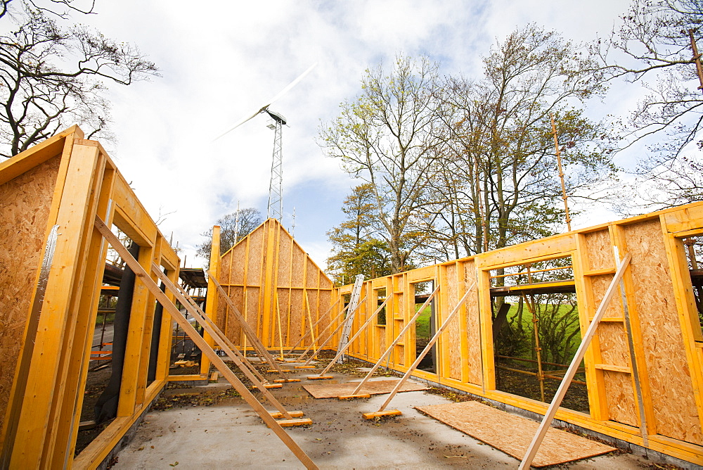 An architect designed eco house with a wind turbine which will provide all the electricity needs of the house near Lesmahagow, Lanarkshire, Scotland, United Kingdom, Europe