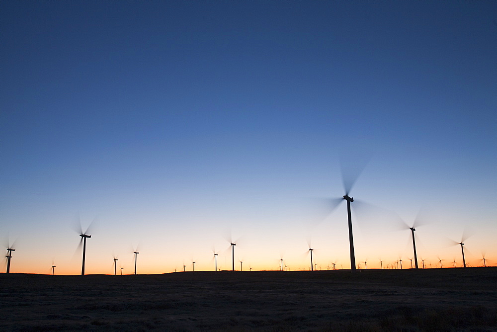 Dawn over Whitlee wind farm on Eaglesham Moor just south of Glasgow in Scotland, United Kingdom, Europe