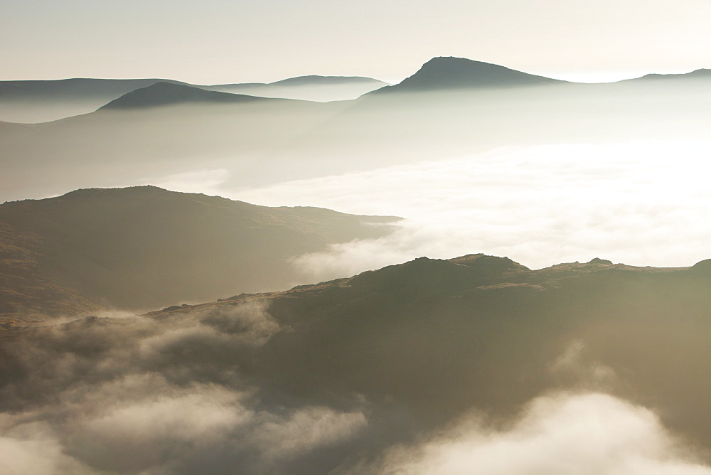 A temperature inversion with valley mist over Red Screes near Ambleside looking towards the Kentmere Fells, Lake District National Park, Cumbria, England, United Kingdom, Europe