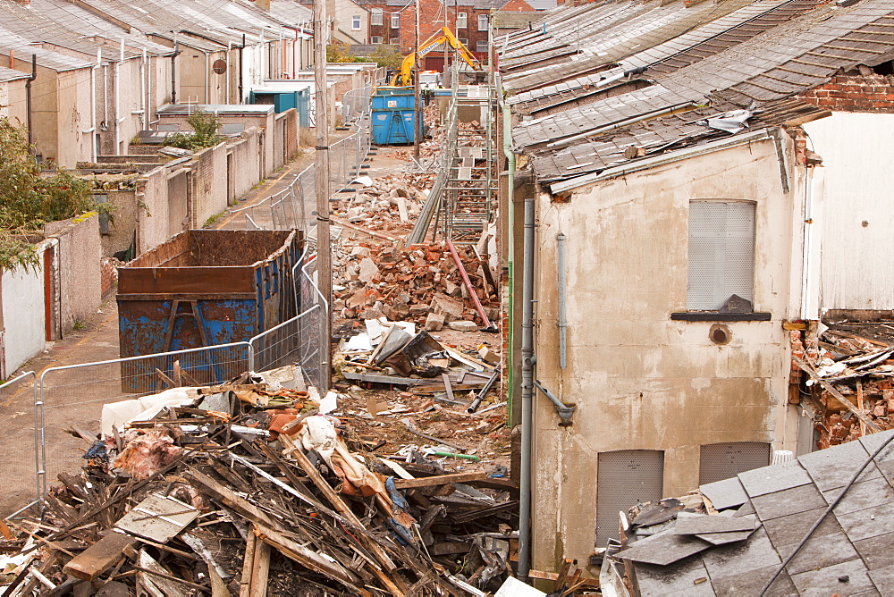 Timber being separated out for recycling at condemned houses being demolished in Barrow in Furness, Cumbria, England, United Kingdom, Europe