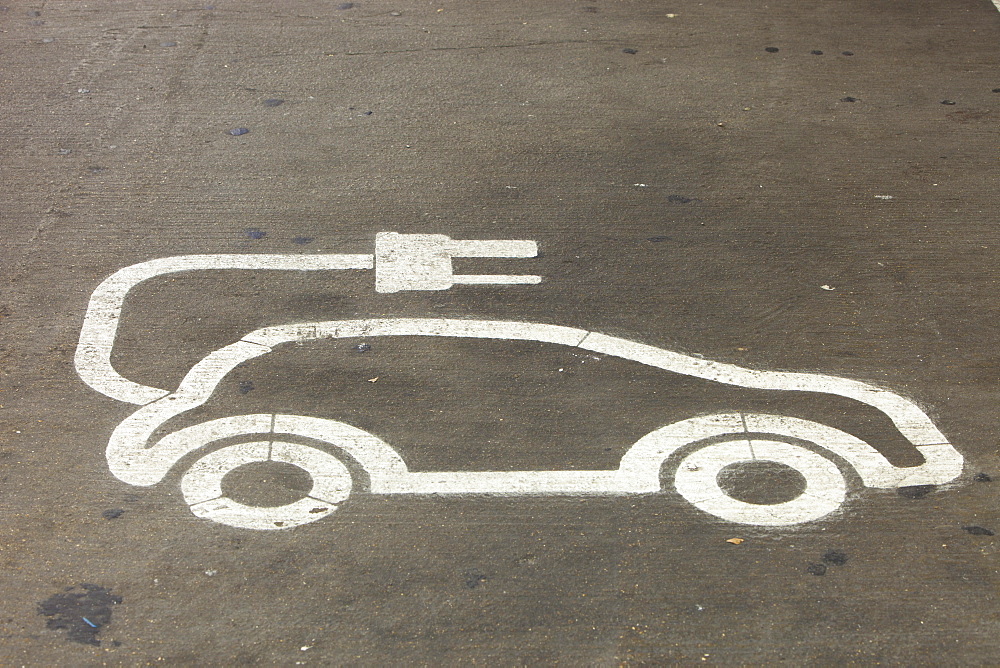 An electric vehicle charging station provided free of charge for customers at Camden Sainsbury's supermarket in London, England, United Kingdom, Europe