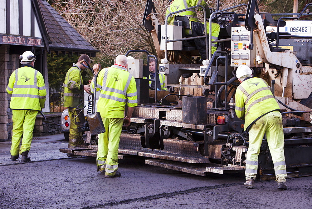 Resurfacing work in Ambleside after floods and harsh winter weather caused serious erosion of the road surface, Cumbria, England, United Kingdom, Europe