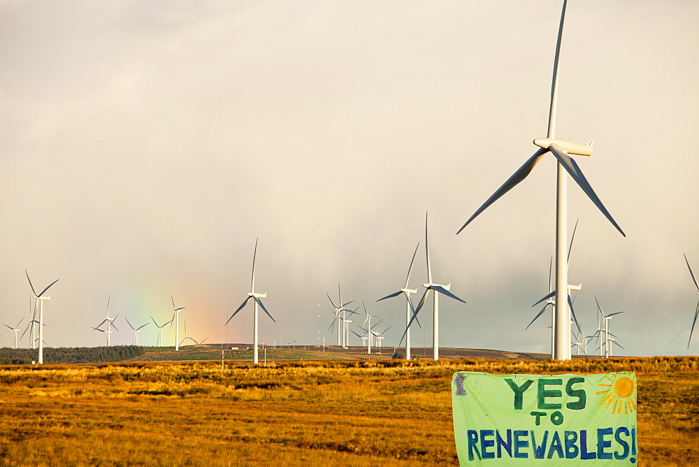 A rainbow over Whitlee wind farm on Eaglesham Moor just south of Glasgow in Scotland, United Kingdom, Europe