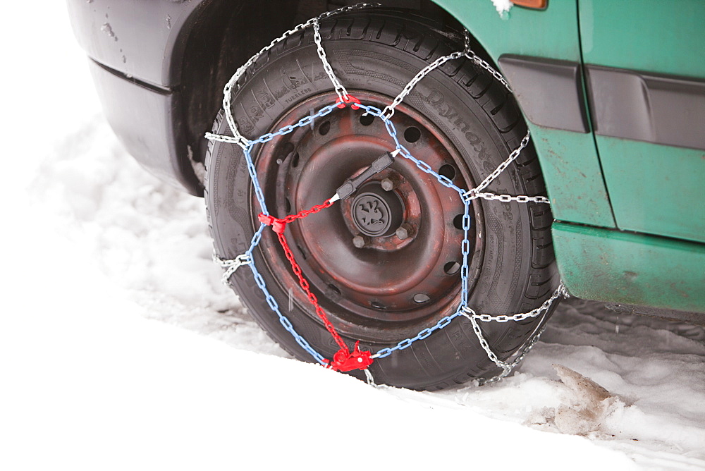 A car with snow chains, Cumbria, England, United Kingdom, Europe